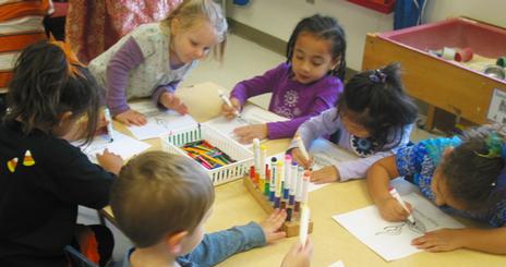 Children coloring at the CDC